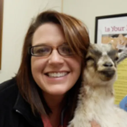 Dr. Emily Lawrence with goat